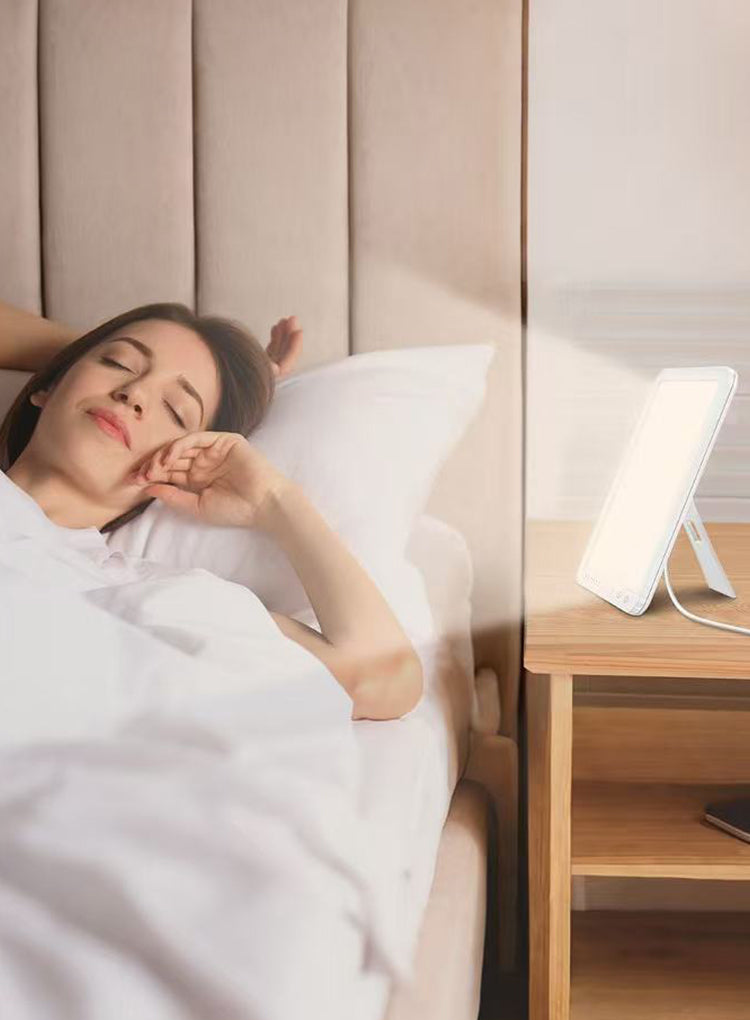 Avreno Tageslichtlampe mit warmem Licht am Nachttisch